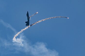 F-22 Raptor with Chaff Deployment